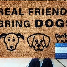photo of real friends bring dogs doormat